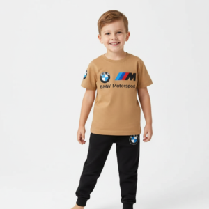 Toddler boy modeling a camel-colored BMW Motorsport short-sleeve t-shirt and black jogger pants tracksuit.
