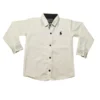 Front view of a boys' soft white cotton button-down shirt with a small black embroidered logo and dark brown buttons.