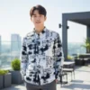 Collection grid showing various colors of men's long-sleeve shirts with abstract textured graphic prints, including white, blue, and earthy tones, displayed both on models and flat-lay